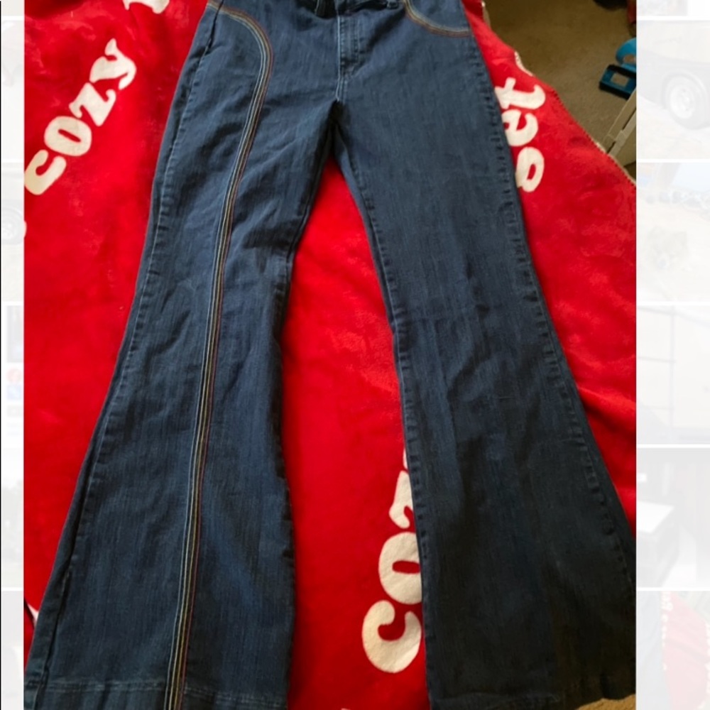 Highwaisted bellbottoms with rainbow stitching these are like new